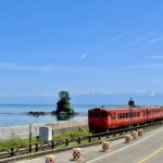 富山県氷見市の立山連峰と女岩を望む絶景